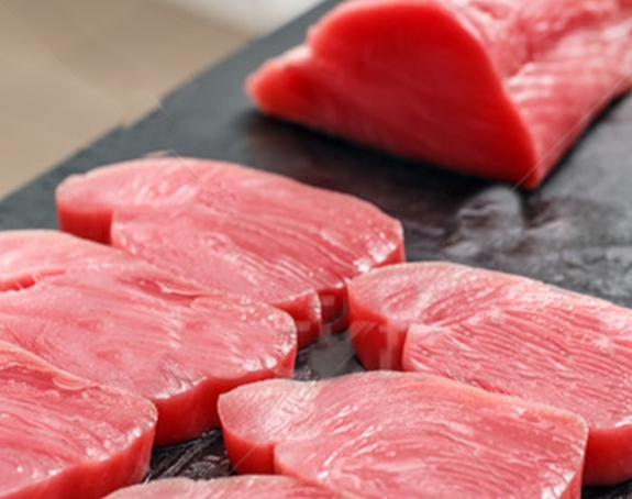 Sashimi-grade fresh tuna cubes ready for poke or sushi.